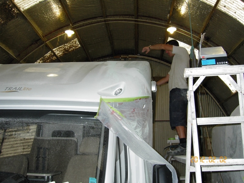 Karl repairing campervan